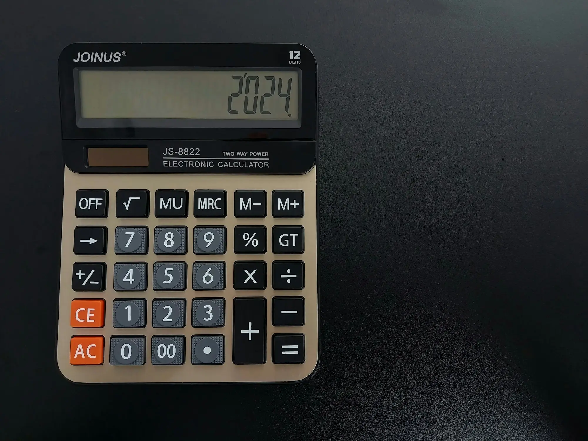 Calculator on a desk for working out the full cost of a loan